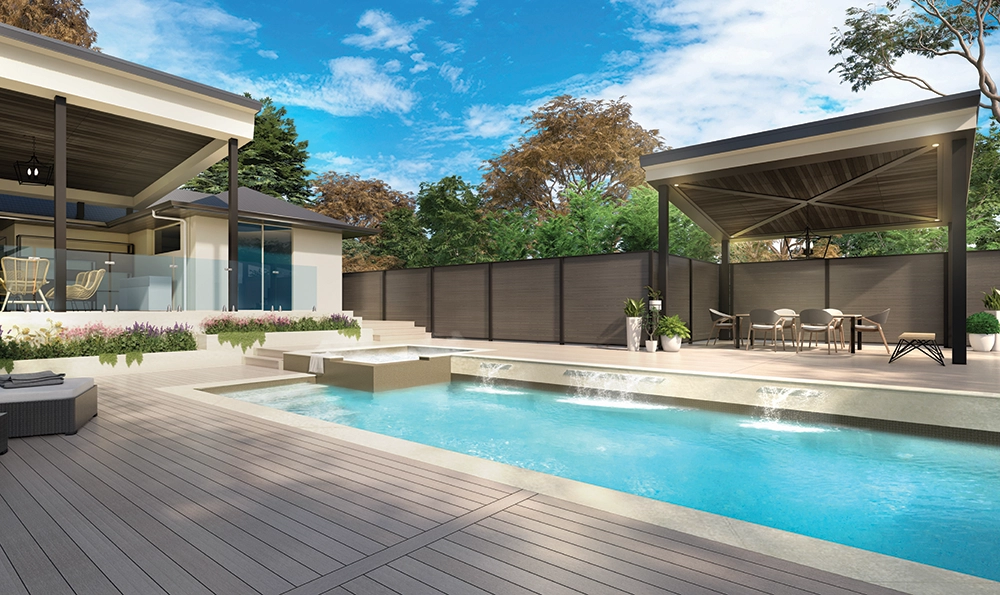 Modern backyard with pool and premium PVC decking showcasing low maintenance, moisture resistant outdoor living space