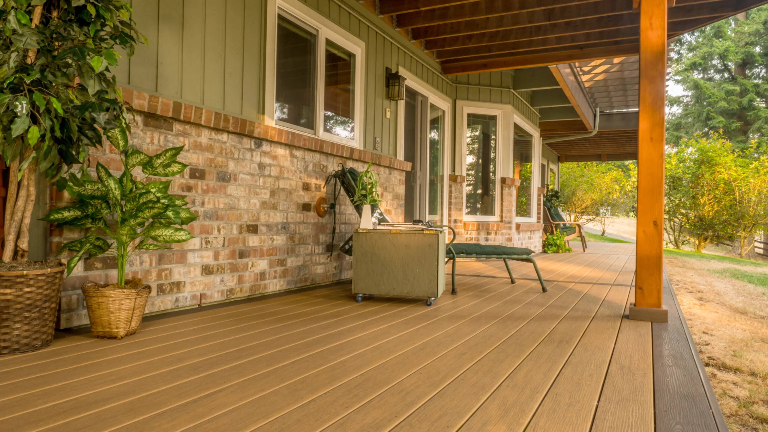 Backyard deck with TruNorth composite decking on covered patio showcasing low maintenance outdoor living space