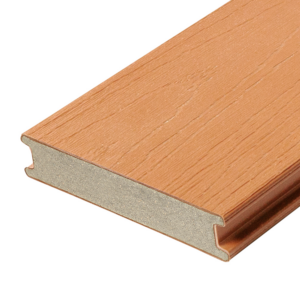 A close up cross section of a TruNorth Decking Accuspan board in the colour Caramel