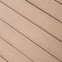 A close up view of TruNorth Decking boards in the colour Sand