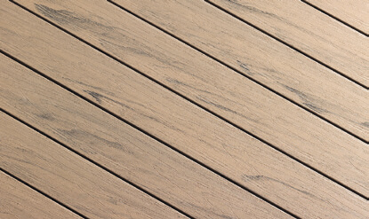 A close up view of TruNorth Decking boards in the colour Hazelwood